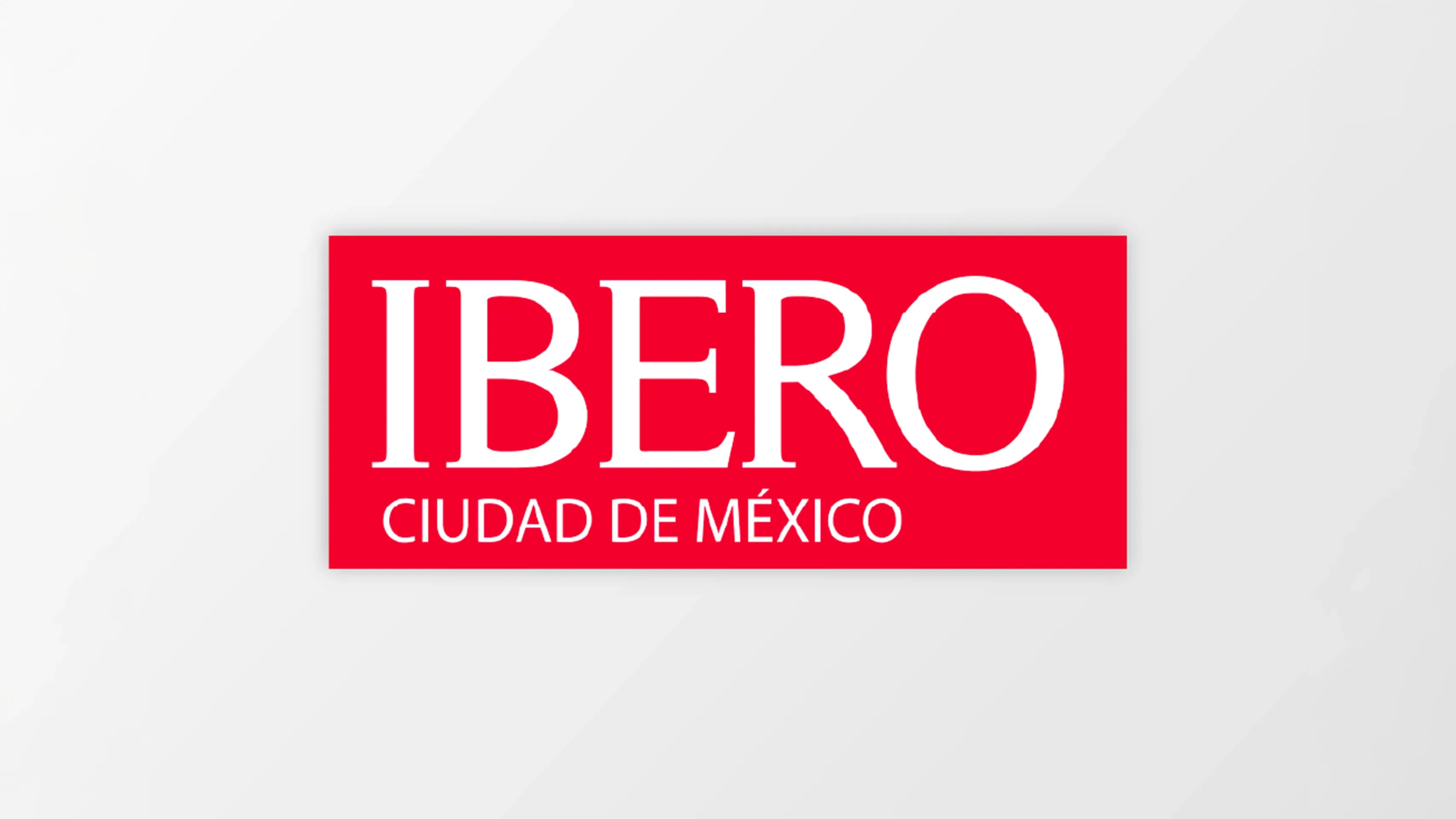 Logotipo de la IBERO en rojo.